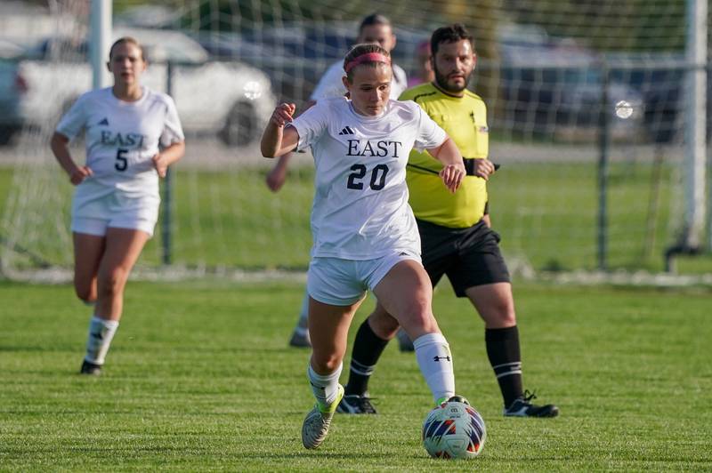 Oswego’s Aubrey Eirich (5) smiles after scoring a goal off of a header against Oswego East during a soccer match at Oswego High School on Tuesday, April 29, 2025.