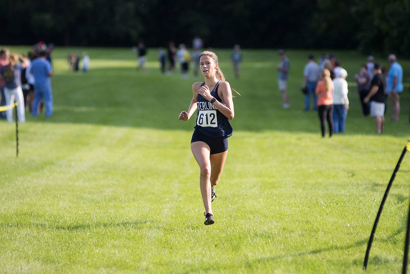 Riley Wade of Sterling cruises to a win in the girl's race at the Twin Cities cross country meet in Sterling, Sept. 13, 2022.