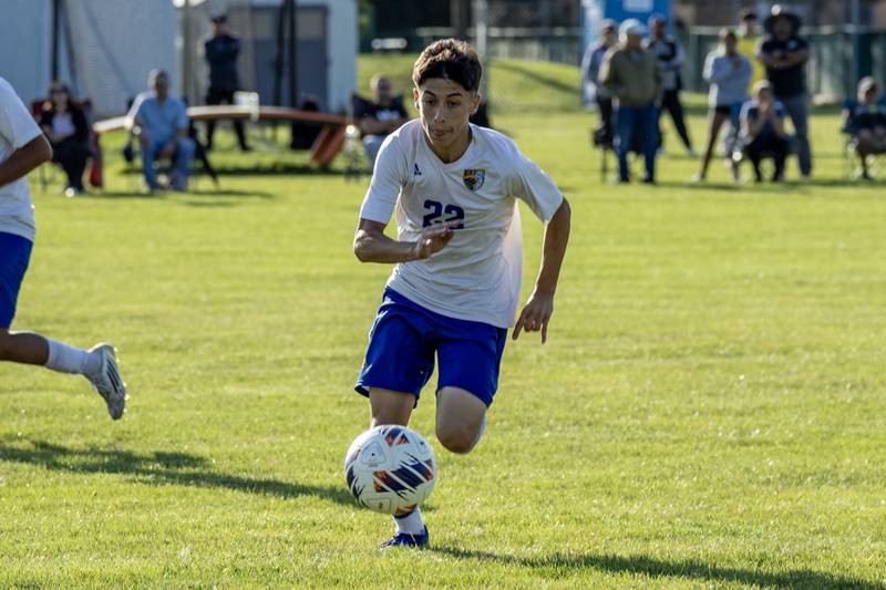 Joliet Central's Jayden Lopez chases the ball during a varsity soccer game against Joliet Catholic at Joliet Catholic on Sept. 8, 2025.