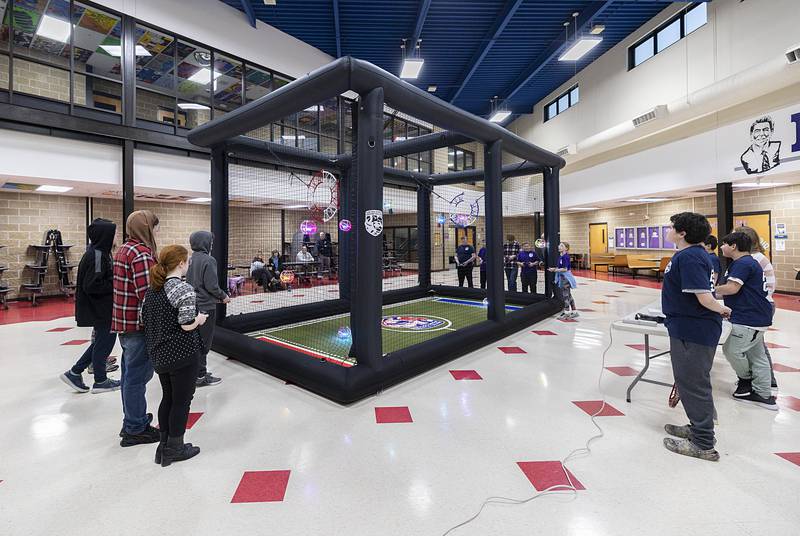 The arena is 10x10x20 with protective netting on all sides. Participants are required to have eye protection within 10 feet of the arena.