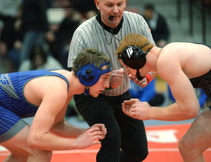 Sterling Newman’s Jacob Newberry (left) and Alden-Hebron’s Logan Crowell start their match at 190 pounds at the 1A Oregon Sectional on Friday, Feb. 14, 2025.