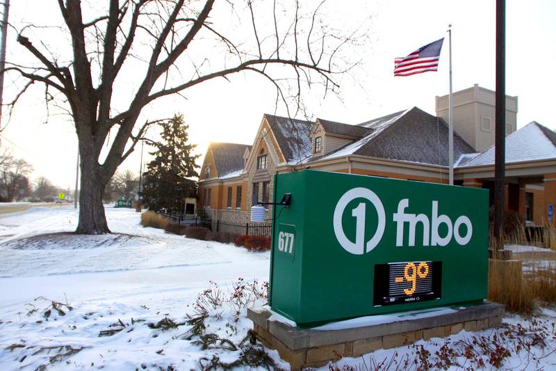 A sign indicates -9 degrees in Marengo on Friday morning as bitter cold and high winds arrived in the wake of Thursday snowfall.