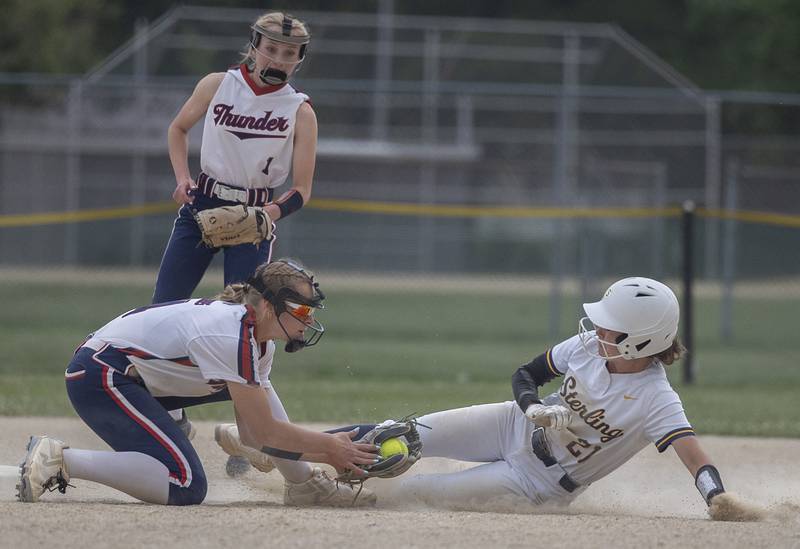 Belvidere North’s Miley Dobbs tags out Sterling’s Kaity Taylor Friday, May 30, 2025, in the Class 3A Regional final in Dixon.