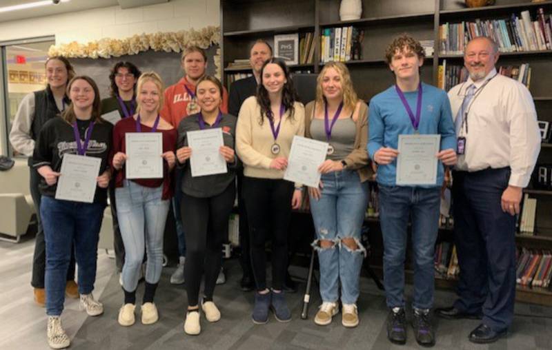 Plano High School Illinois State Scholars were recognized at the January Board of Education meeting. Pictured from left are Rachel Carter, Chloe Hulbert, Kathleen Polomchak, Kensi Kensel, Ireland Dye, Imani Evans, Superintendent Tony Baker, Sasha Helfgott-Waters, Ryenn Foote, Giovanni Diaz and Plano High School Principal Jim Seput.