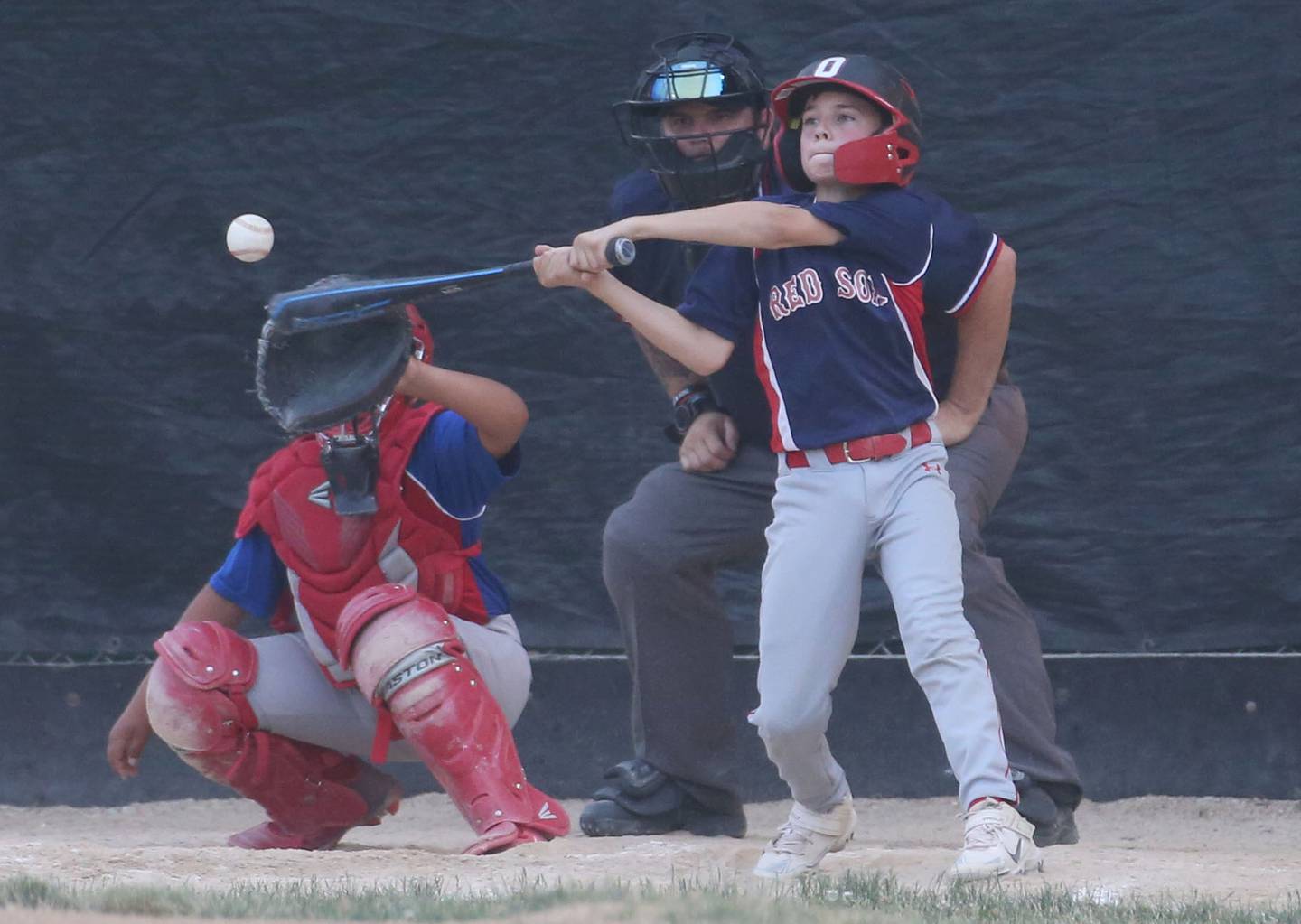 Thrush Sanatation Red Sox's Rocco Affranti hits a single against Frostbyte MSP Rangers in the Ottawa Little League baseball (12U) City Championship on Friday, June 23, 2023 at Varland Park in Ottawa.