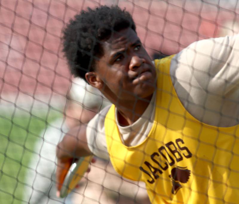 Jacobs’ Prince Barnes competes in the discus  in Fox Valley Conference boys track and field meet action at Huntley High School in Huntley on Thursday, May 15, 2025.