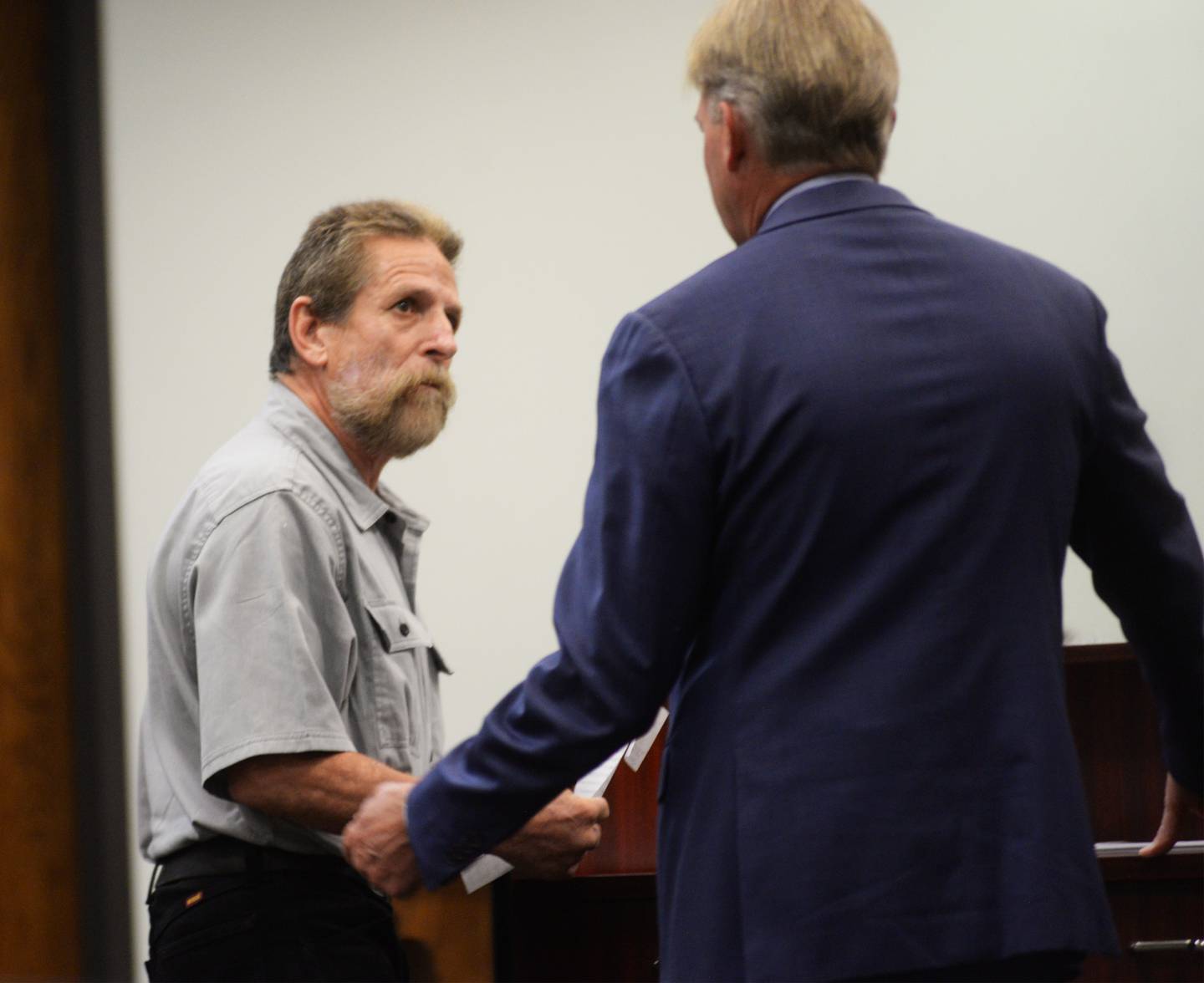 Steven Watts (left) talks to his attorney Robert Thompson during his court appearance on Tuesday, July 26, 2023 before Judge Jacquelyn Ackert.