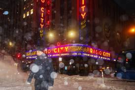 Northeast sees more snow from the tail end of a colossal winter storm, at least 13 deaths reported