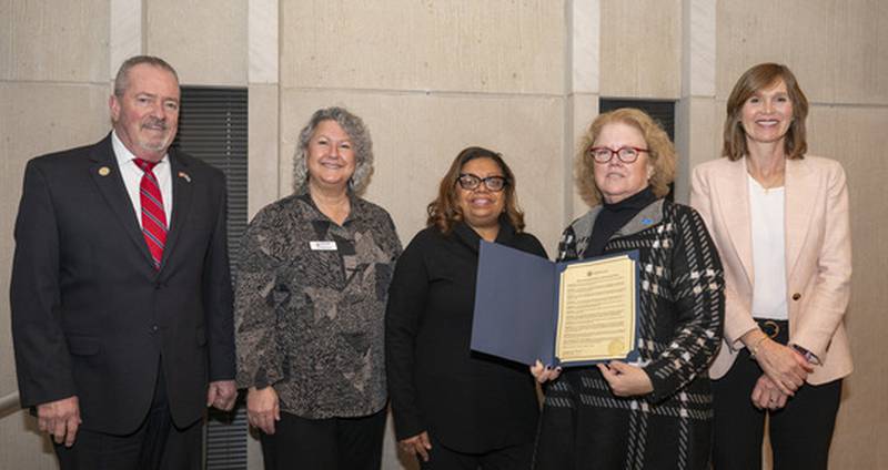 Pictured are J. Kevin Hunter; Lori Nerheim, vice president of marketing and communications for United Way of Lake County; Gale Graves, vice president of community impact for United Way of Lake County; Kristi Long; and Sandy Hart.