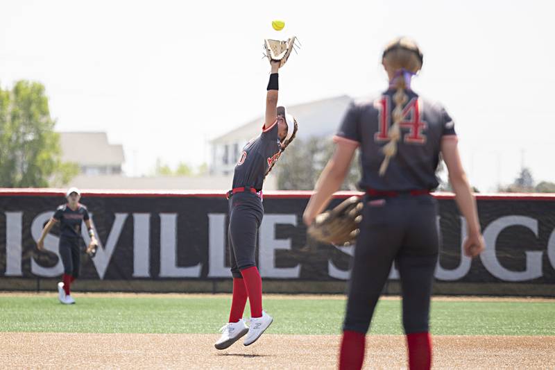 Charleston’s Blair Ritchey reaches for a high hopper against Antioch Friday, June 9, 2023 in the class 3A state softball semifinal.