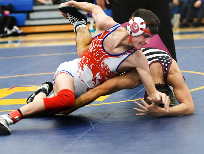 Oregon's Lane Halverson makes a move on Dakota's Jason Bowers in the championship match at 138 pounds at the 1A Polo Wrestling Regional held at Eastland High School on Saturday, Feb. 4.