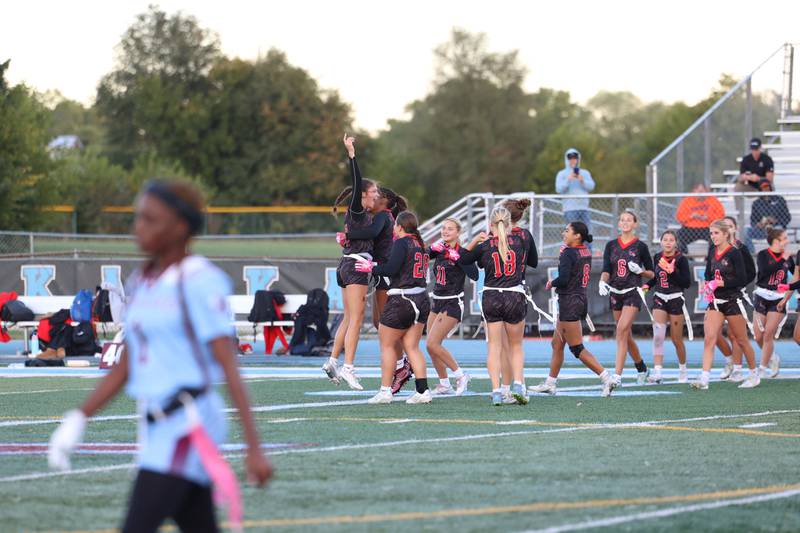 Yorkville players celebrate their win as the clock runs out during the Foxes' 26-13 victory over Kankakee on Tuesday, Oct. 7, 2025.