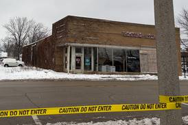 After roof collapse in Woodstock, it’s unclear when street will reopen, if building will remain standing