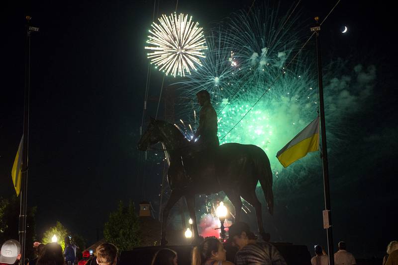 Fireworks light up the sky behind the Reagan statue in Dixon Sunday, July 3, 2022 as the Petunia Fest nears to a close. The day ended with hip-hop group “Too Hype Crew” entertaining a huge crowd.
