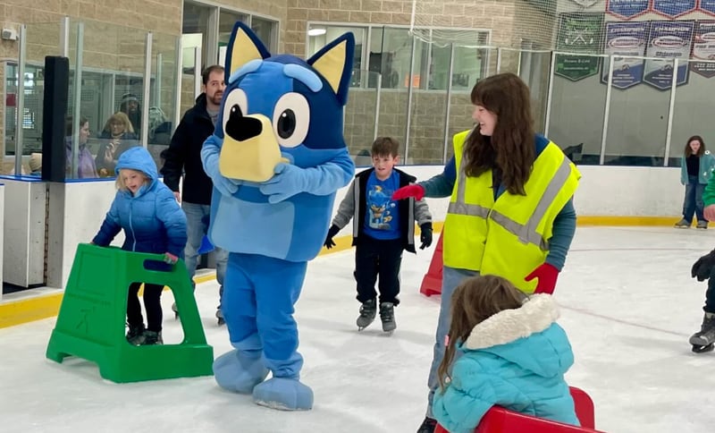 Bluey, the star of the Australian-based cartoon of the same title, glides on the ice Saturday at Ice Valley Centre Ice Arena during Kankakee Valley Park District’s annual Winter Fest.
