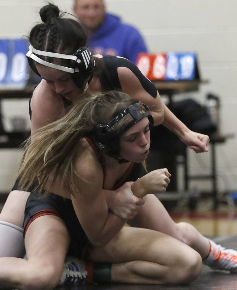 Morris’ Maggie Gordon controls Huntley’s Alissain Lessner the 110-pound match of a nononference wrestling meet on Wednesday, Jan. 22, 2025, at Huntley High School.
