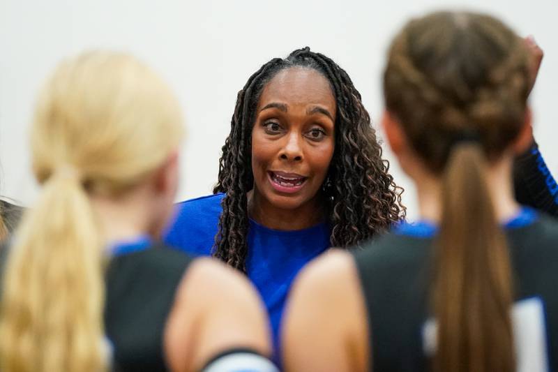 St. Charles North's head coach Lindsey Hawkins talks to her team during a non-conference match against Huntley at St. Charles North High School on Wednesday, Sept. 3, 2025.