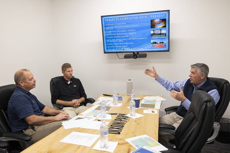 Congressman Darin LaHood (right) gestures while speaking with Dixon Park District executives Duane Long (left) and Seth Nicklaus Friday during a meeting Friday, Oct. 18, 2024, at The Facility.