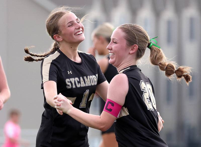Sycamore's Cortni Kruizenga (right) celebrates after scoring a goal with teammate Elizabeth Goff during their game against Dixon Thursday May 15, 2025, at Sycamore High School.