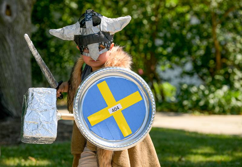 Jesus Rodriguez, 7 from Geneva joins in on the fun as a Viking Warrior during the Swedish Days Kids Day Parade on Friday, June 21, 2024.