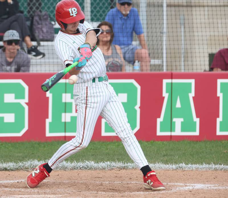 L-P's Nick Salazar makes contact with the ball against Morris on Friday, April 17, 2026 at Huby Sarver Field in the L-P Athletic Complex in La Salle.