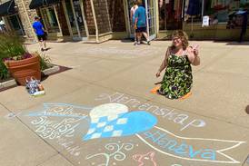 Geneva businesses create Swedish Days chalk art 