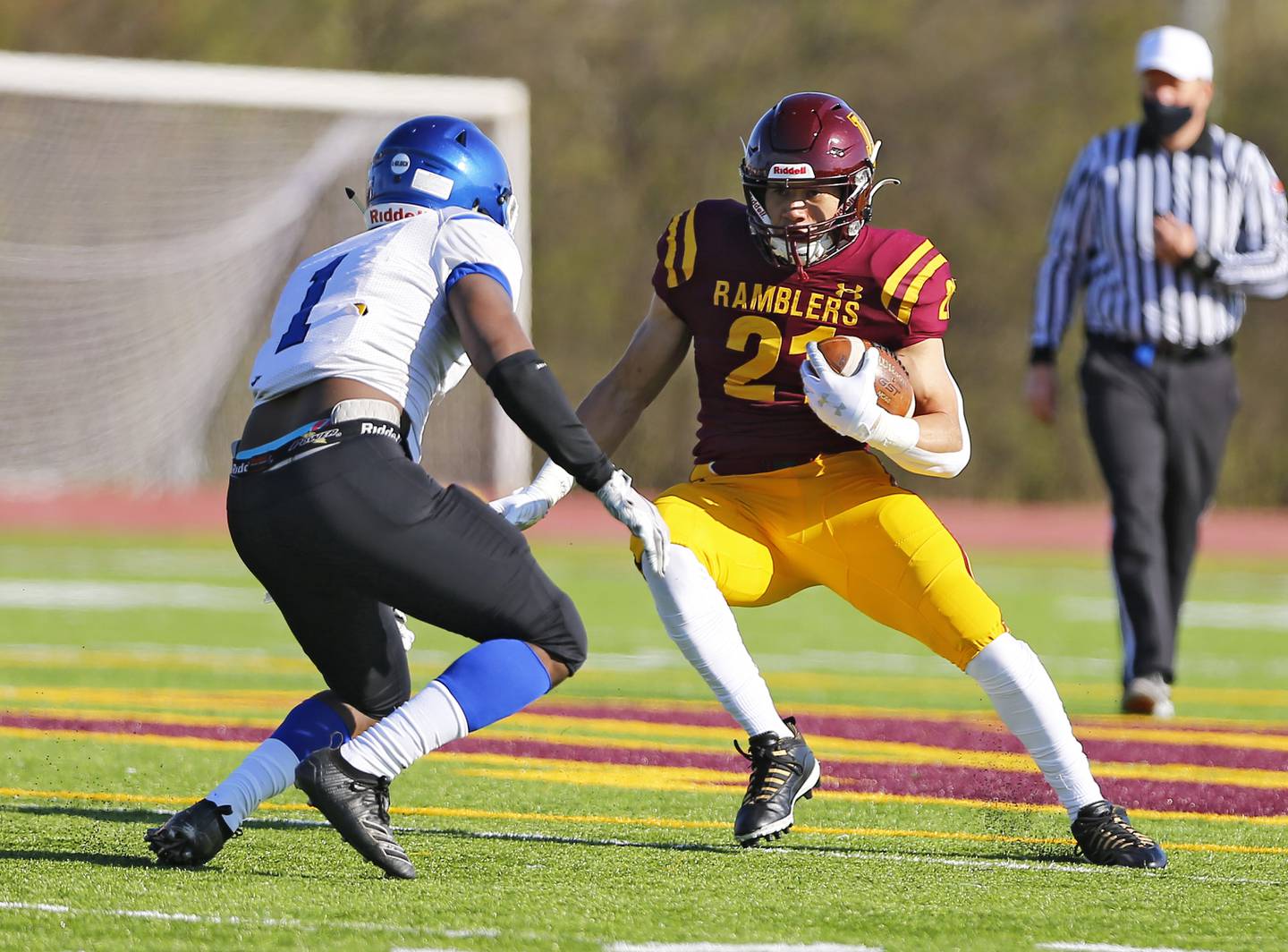 Loyola Academy's Vaughn Pemberton runs the ball as the Phillips Academy Wildcats faced the Loyola Academy Ramblers on Friday, April 16, 2021 in Wilmette, IL. Loyola won 30-0.