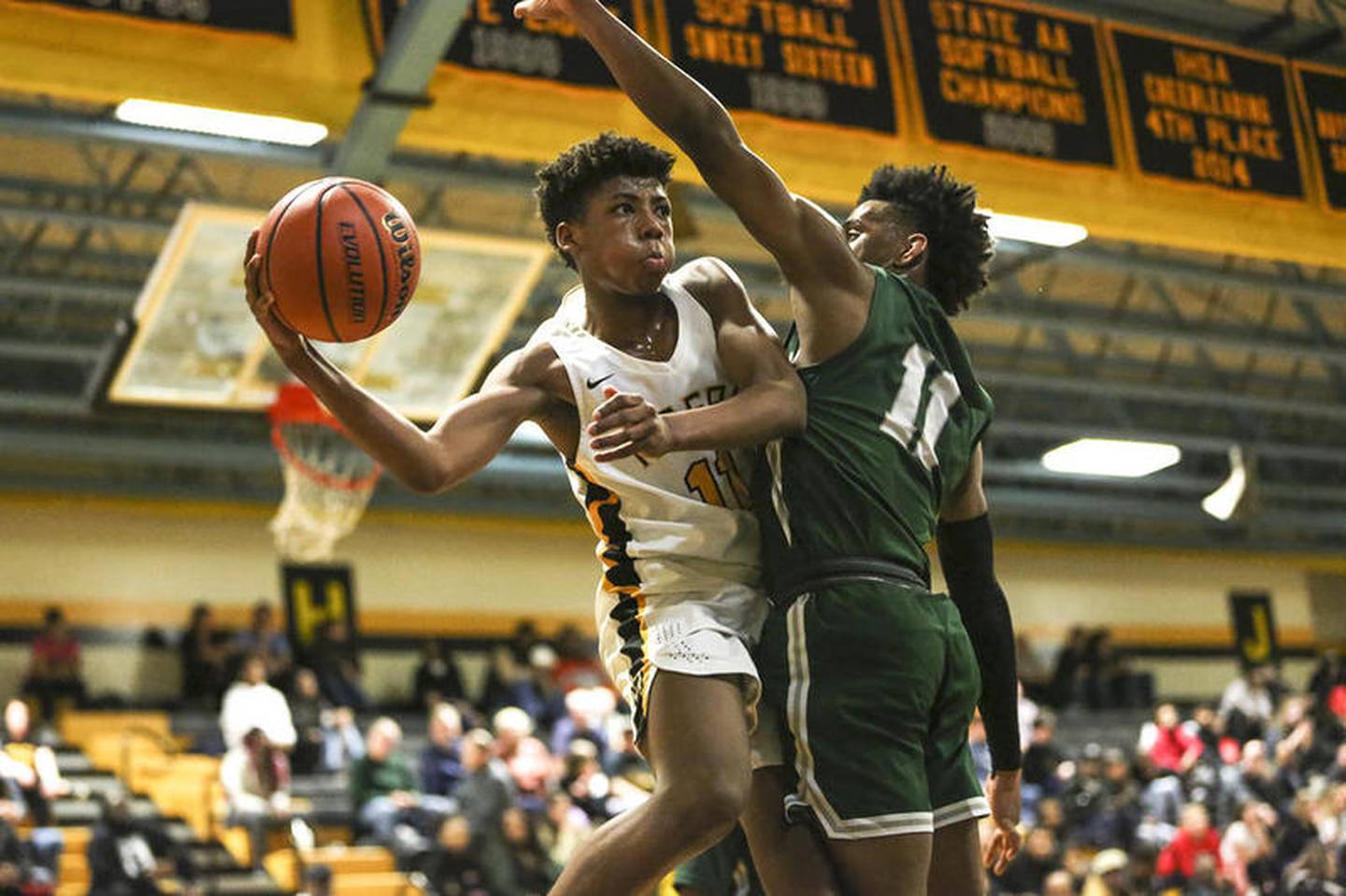 Joliet West's Jeremy Fears Jr. dishes the ball out after driving into the paint on Monday, Feb. 24, 2020, at Joliet West High School.