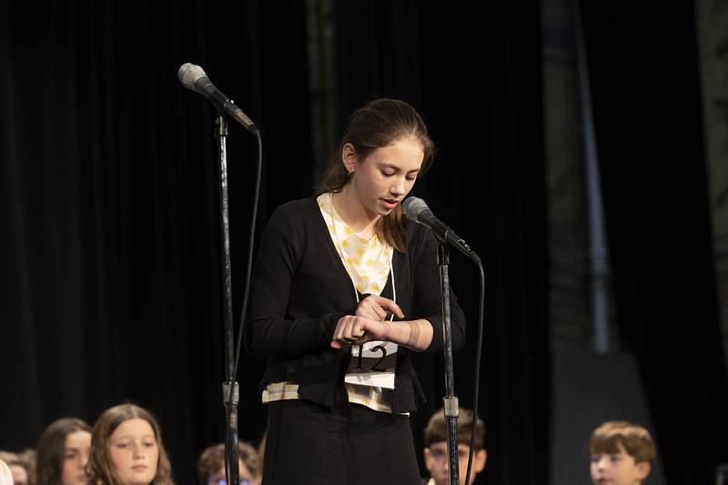 Forreston 7th grader Cora Schmidt competes Thursday, Feb. 21, 2024 at the Lee-Ogle-Whiteside regional spelling bee. Schmidt missed the word “emmisary” in round five.