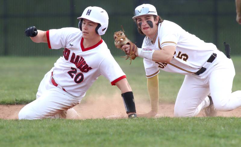 Huntley’s Haiden Janke, left, is out at second after Jacobs’ Gage Martin applied the tag in varsity baseball Wednesday at Huntley.