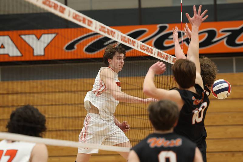 Plainfield East’s Jack Robertson hits a shot off the defense  for a point against Lincoln-Way West on Wednesday, March 22nd. 2023 in New Lenox.