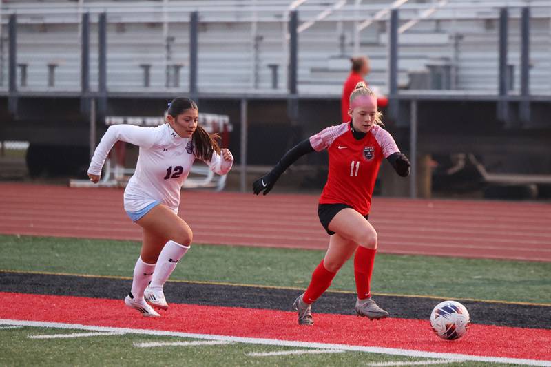 Bradley-Bourbonnais' Rylee Villegas breaks away from Kankakee's Stacy Calva during the Boilermakers' 3-2 victory over Kankakee in the All-City matchup on Thursday, March 27.
