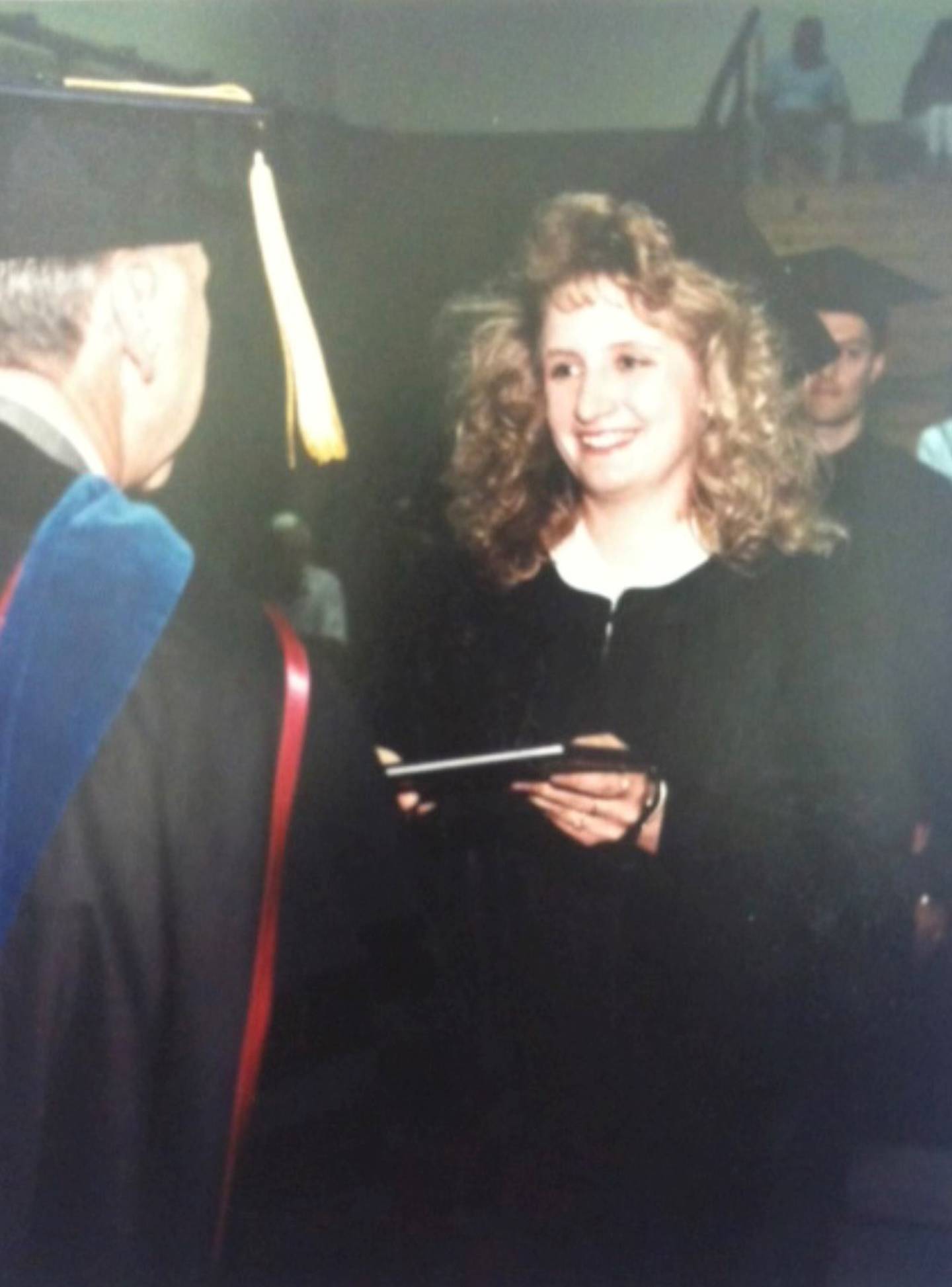 The future president receives her diploma from President Al Wisgoski at IVCC’s May 1991 commencement