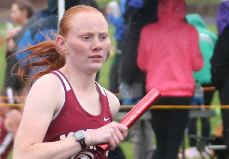 Morris's Meghan Bzdill runs the 4x800 meter relay during the Class 2A girls track and field Sectional on Thursday, May 9, 2024 in Princeton.