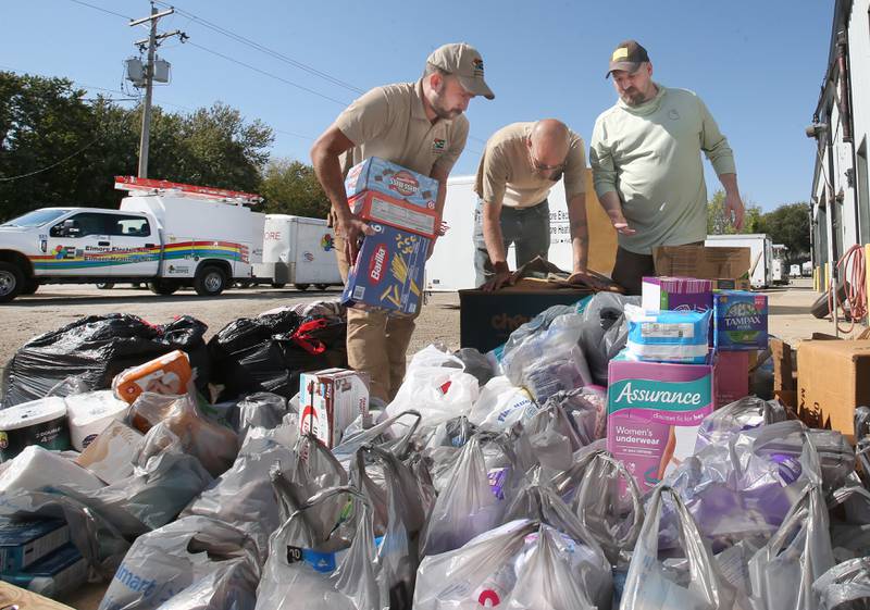 (From left) Elemore Electric employees Dan Elmore, Sky Abrassart and Nolan Drake, load hundreds of supplies into a trailer that will be sent to areas effected by Hurricane Helene on Friday, Oct. 4, 2024 at their shop in Dover. The crews left Dover Friday morning and are headed to Hendersonville and Spruce Pine N.C. to assist in the Hurricane Helene relief efforts. Over 100 donations of food, clothes, medicine, personal care products and much more were donated by people in Princeton and surrounding communities to help those in need in Western N.C. 
Elmore Electric submitted an application was selected through The Baptist on a Mission disaster relief program to provide supplies and help in some of the hardest hit areas. The program provides ways for Christians to minister to people who are hurting from disasters. The business is grateful for the amazing support received from Princeton and surrounding communities for the hurricane Helene disaster relief efforts.