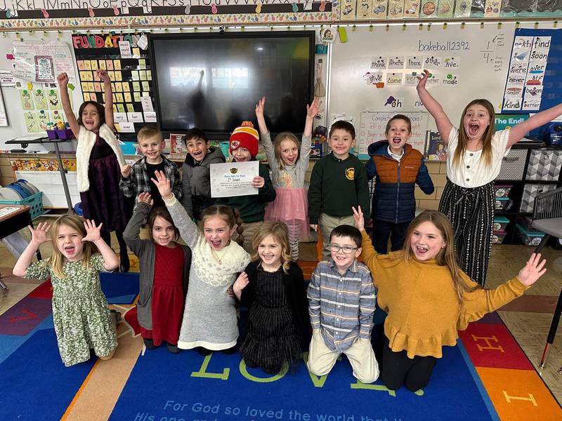 The first grade class at St. Michael the Archangel Catholic School in Streator raised the most money among other classes in a competition to collect coins for the Streator United Way.