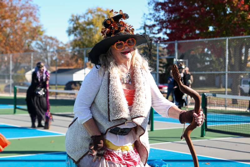 The “Hocus Pocus Hags” dance at the annual trick or treat at Washington park on Saturday, October 26, 2024 in Peru.