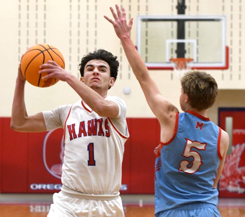 Oregon's Benny Olalde drives to the basket against Woodstock Marian at the Oregon Boys Basketball Thanksgiving Tournament on Wednesday, Nov. 26, 2025 at the Blackhawk Center in Oregon.