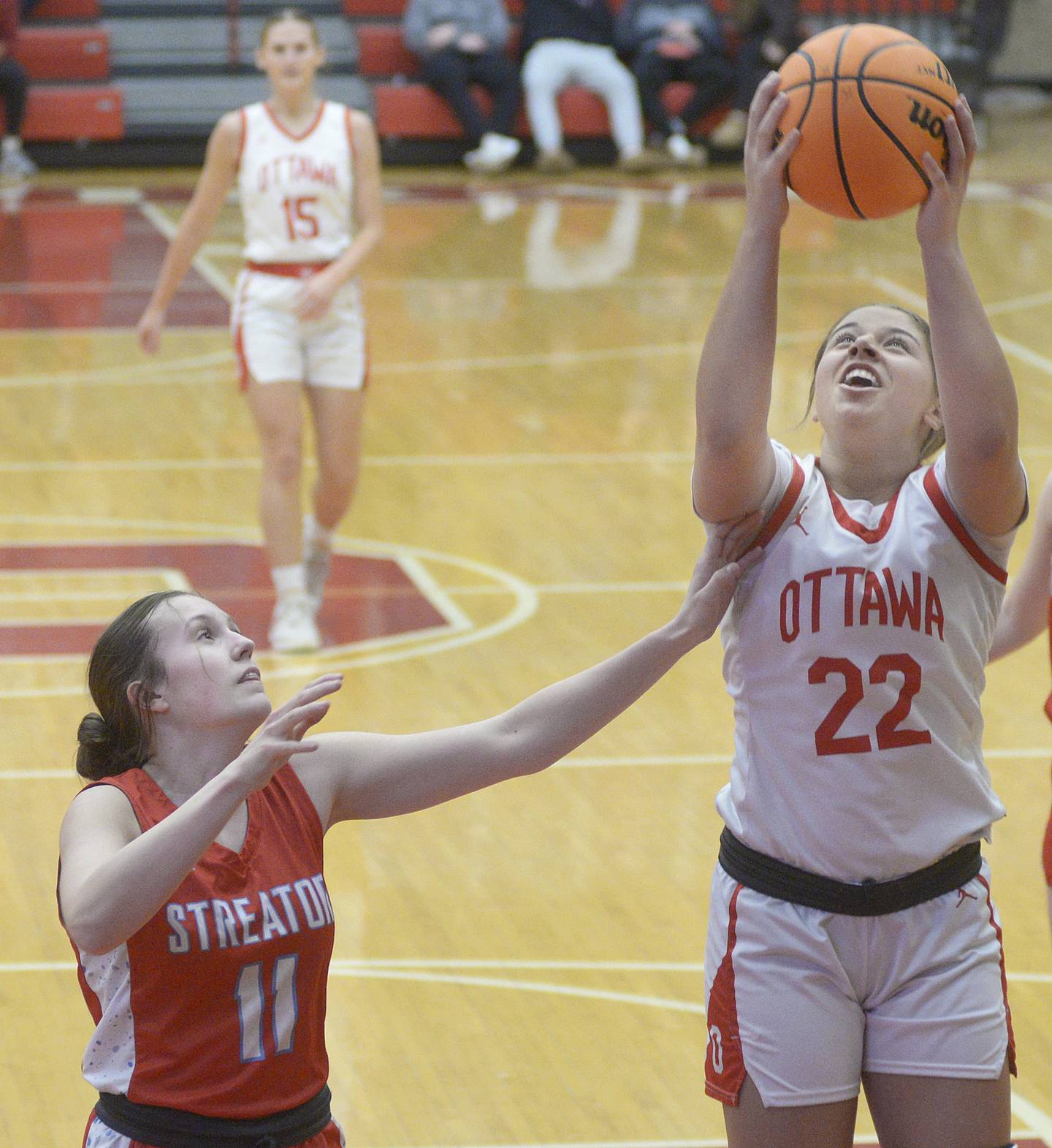 Streator’s Ava Gwaltney tries to stop Ottawa’s Marlie Orlandi from getting a shot away in the 2nd period Thursday at Ottawa.