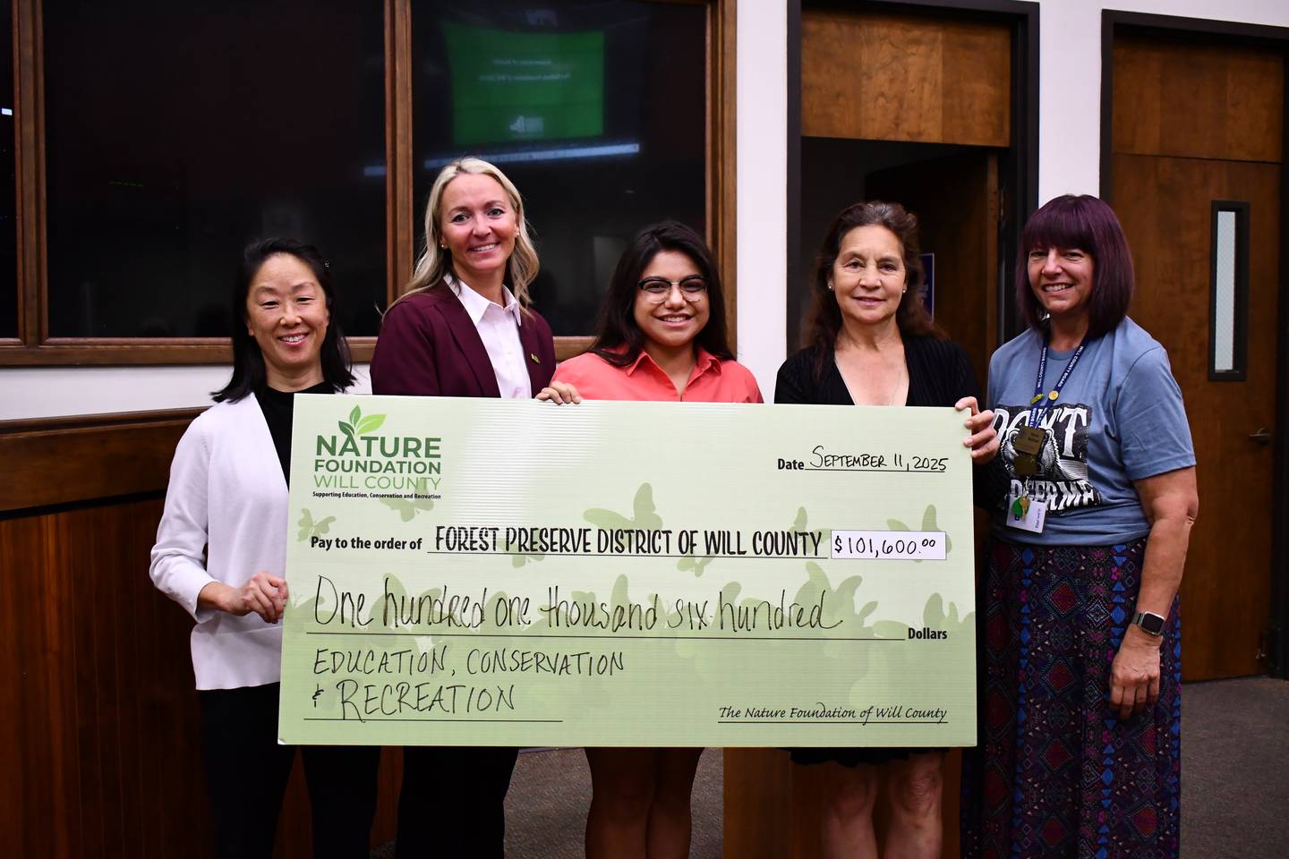 Nature Foundation of Will County Executive Director Tara Neff (from left), Forest Preserve Executive Director Tracy Chapman, Forest Preserve Board President Destinee Ortiz, and Foundation and Forest Preserve board members Julie Berkowicz and Dawn Bullock. The foundation presented its quarterly donation to the district on Sept. 11, 2025.