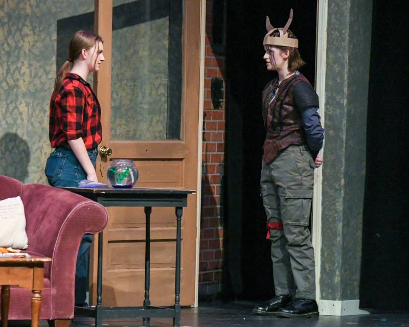 Jazar played by Zoe Jaksa, right, talks with Tammy played by Tess Larmon, after Tammy flushes a goldfish down the drain during a one act play of the Fallen goldfish on Saturday March 22, 2025, held at Lyons Township High School south campus.