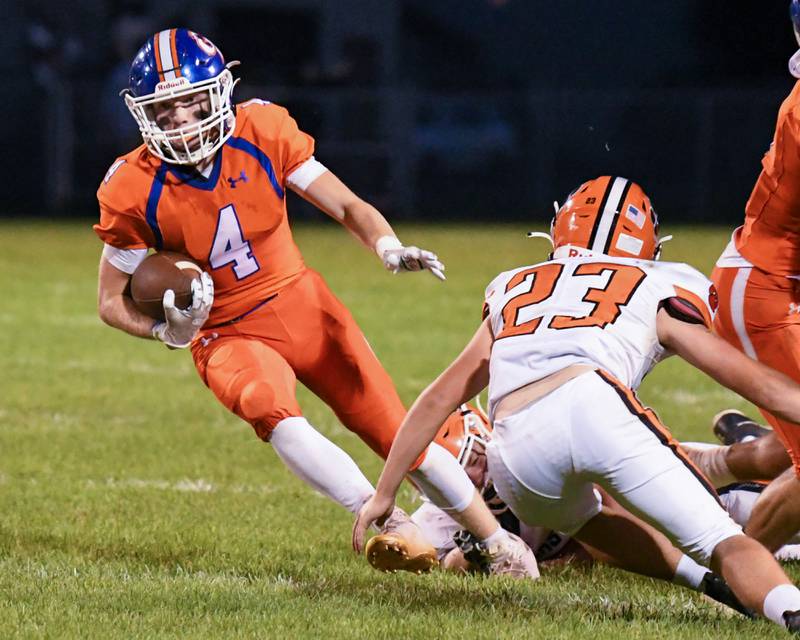 Genoa-Kingston Ethan Wilnau (4)  runs the ball before being tackled in the second quarter by Byron players at home at Geno-Kingston on Friday Sep 16th.