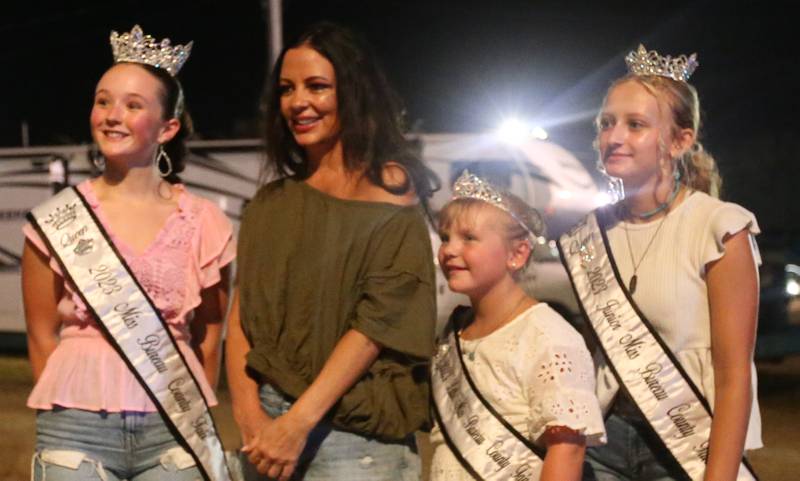 Sara Evans poses with Bureau County Fair queen Kelsey Mongan, Little Miss. Mia Jacobs and Jr. Miss.MacKenzie Sherman on Thursday, Aug. 24, 2023 at the Bureau County Fair in Princeton.