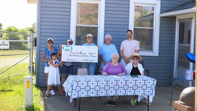 Marseilles Bridge Walk honors Dr. Sutton, includes $10K donation
