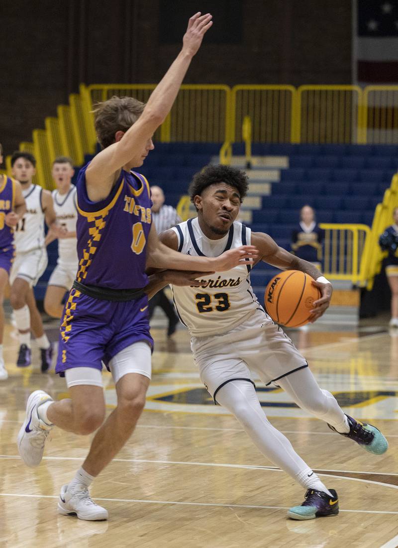 Sterling’s Kaeden Phillips works against Sherrard’s James Blackwell Monday, Dec. 16, 2024, at Sterling High School.