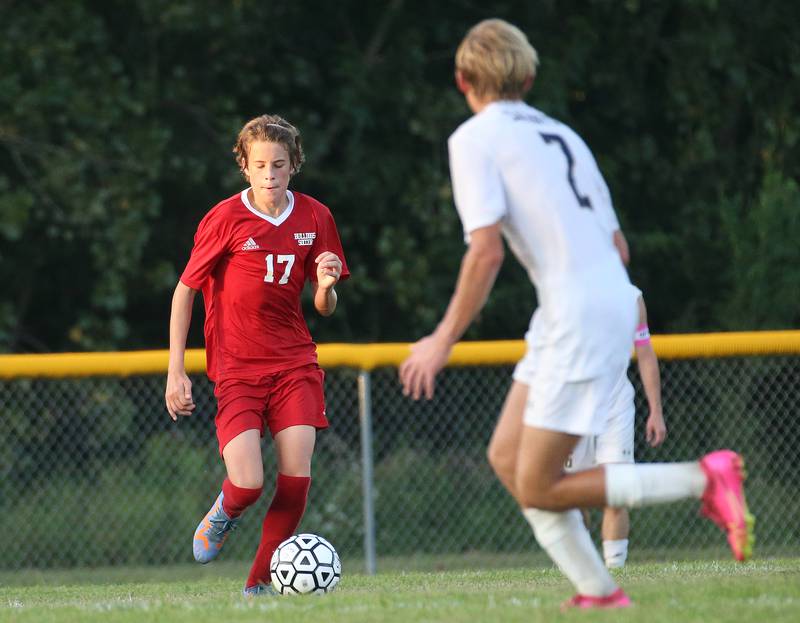 Streator's Dalton Sliker gets the ball away from Bloomington Central Catholic's Jack Wyse on Wednesday, Aug. 23, 2023 at St. James Street Recreation Area in Streator.