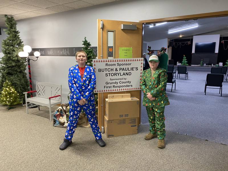 Butch and Paulie, Santa's elves, stand guard outside Storytime Land.