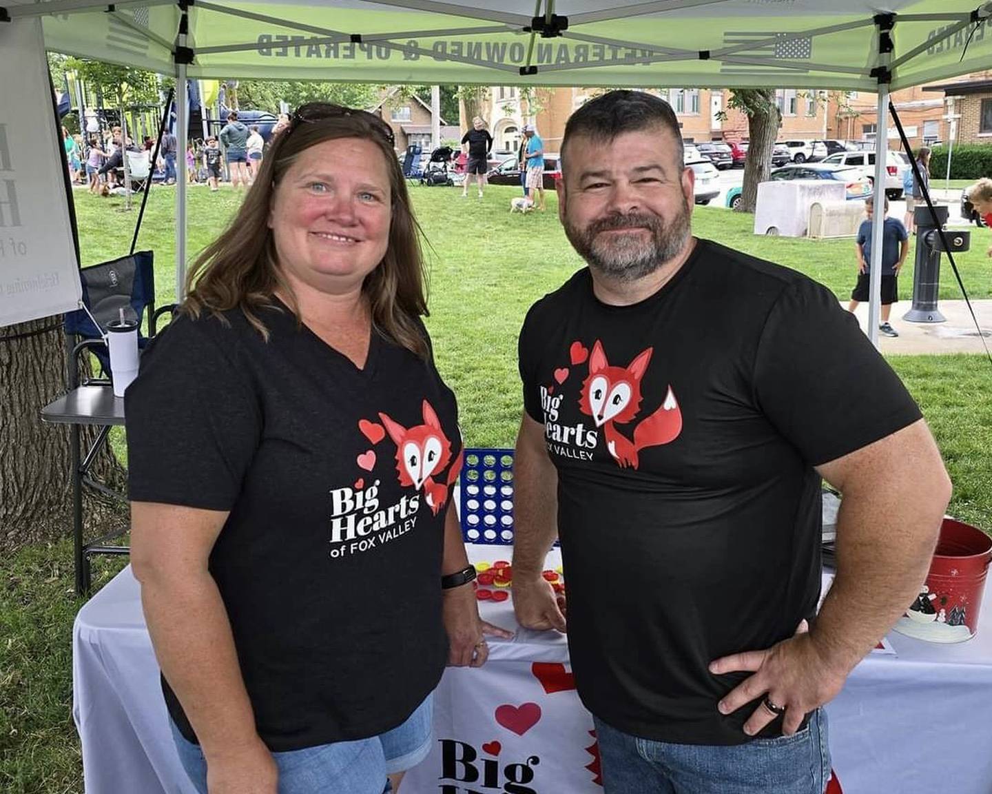 Big Hearts of Fox Valley board member Jill Caccia and co-founder Minor Mobley at the concert in the park event in Lincoln Park in St. Charles on June 27, 2024.