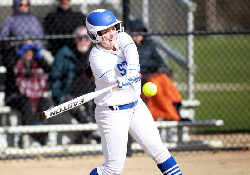 St. Charles North's Julianna Kouba makes contact during a game against Wheaton North on Tuesday, April 15, 2025 in St. Charles.