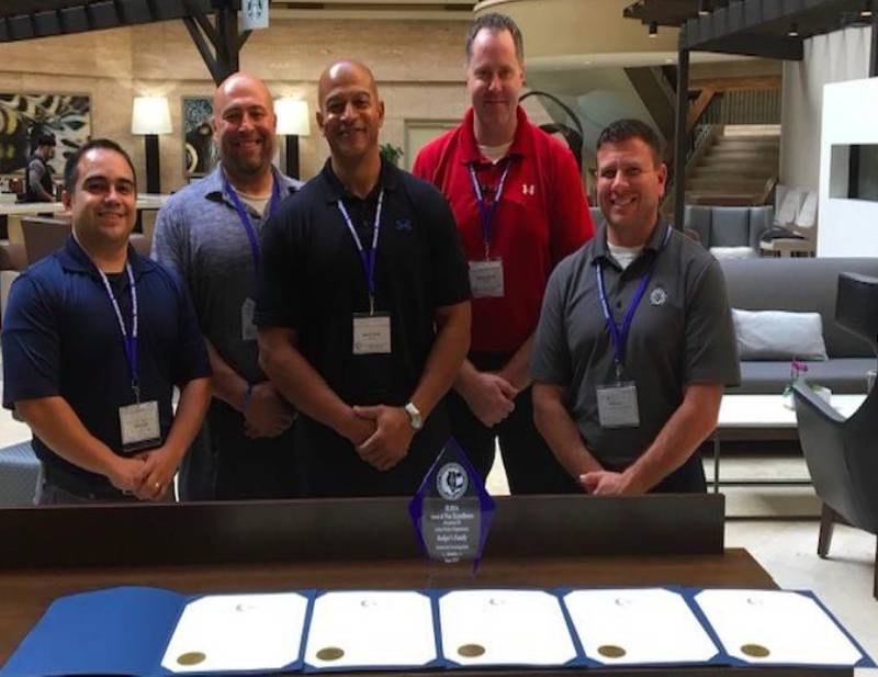 Joliet police detectives receiving an award for solving the deaths of two women and a baby who died in a house fire on June 3, 2017.